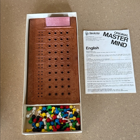 Invicta Mastermind Game with Brown Board and Multicolor Pegs - Picture 2 of 2